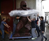 Assistants of French chocolate maker Jean-Paul Hevin unload a four-metre tall chocolate King-Kong created by Richard Orlinski in Paris