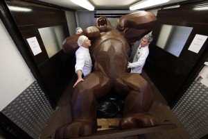 Assistants of French chocolate maker Jean-Paul Hevin work on a four-metre tall chocolate King-Kong created by Richard Orlinski in Colombes