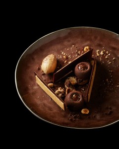 Pomponettes mi-cuites made from Venezuela grand cru chocolate, caramelized Piedmont hazelnuts and caramel ice cream a la Arabica made by Fabien Berteau