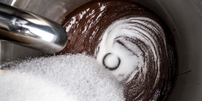 adding sugar to our chocolate spread