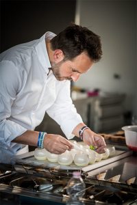 Michalak preparing one of his elaborations at Hangar 78