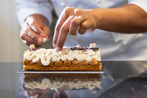 Placing the nuts over the cake