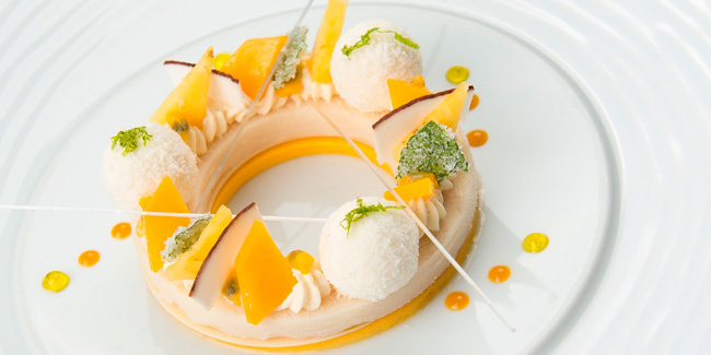 Exotic mango, coconut, passion fruit and crystallized mint leaves mojito by Patrice Ibarboure