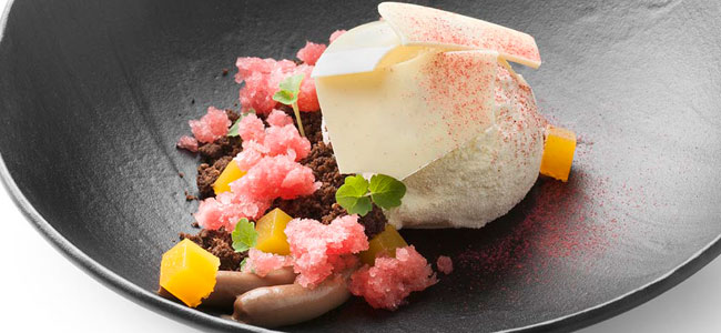 Hora del vermut with granité, chocolate crumble, ice cream, and orange jelly by Pieter de Volder