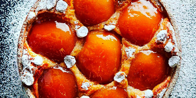 Cider infused caramelized apple tart with grapefruit jam