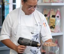 Student unmolding the cake