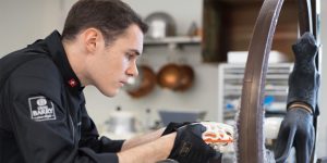 Elias Läderach working on a chocolate sculpture