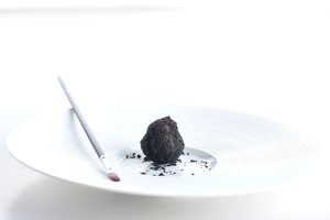 Chocolate truffle with coffee plated dessert by Marco d’Andrea