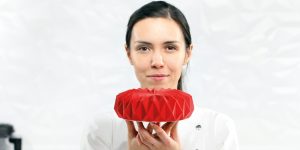 Dinara Kasko with one of her creations