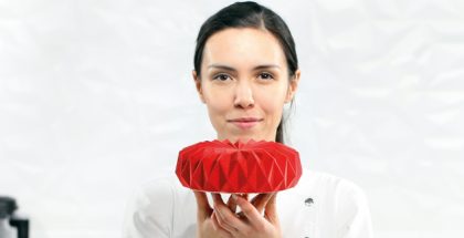 Dinara Kasko with one of her creations