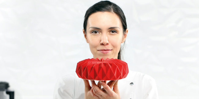 Dinara Kasko with one of her creations