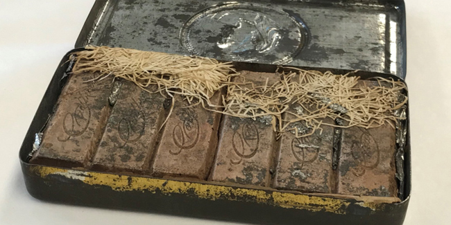 A 120-year-old chocolate box found among Australian poet Paterson’s papers