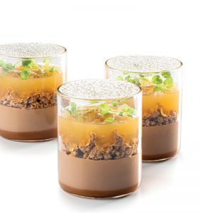 Sudachi, milk chocolate, and soy caramel dessert in a glass by Albert Daví 