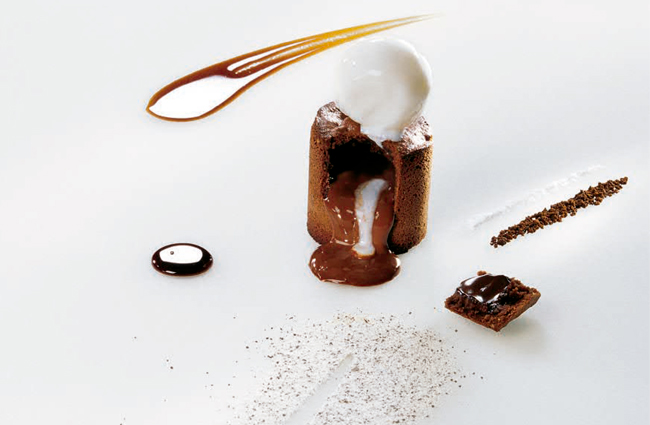 Biscuit de chocolat ‘coulant’ with cocoa aromas and chocolate syrup with Aubrac tea by Michel Bras