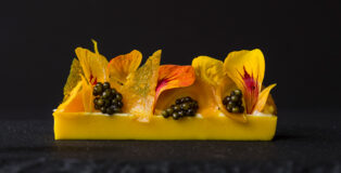 Gold beet panna cotta, bergamot, Osetra caviar, fermented cashew cream, mandarin, nasturtium by Roberto Cortez