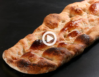 Coca de Forner (baker’s sweet bread) forming and flattening, the true bread videos (4 of 6)