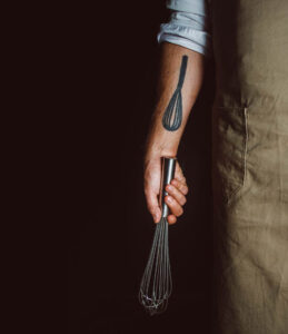 Jesús Escalera tattoed arm