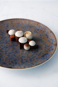 Coffee dessert with caramel star anise, sablé buckwheat, and ice cream by Tom Coll