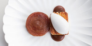 Apple tatin with Lapsang Souchong Caramel, spicy cream, and coconut sorbet by Eunji Lee