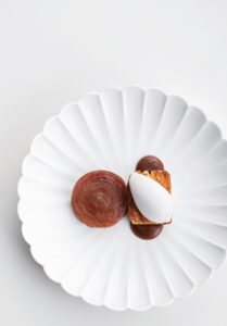 Apple tatin with Lapsang Souchong Caramel, spicy cream, and coconut sorbet by Eunji Lee