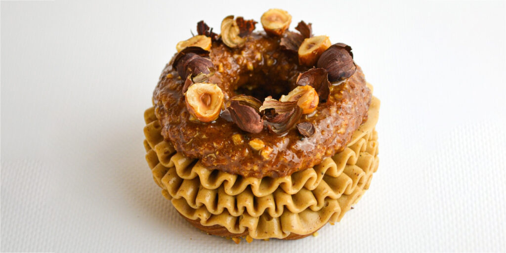 Paris Brest dessert with roasted hazelnut and praline glaze by Alexandre Thabard